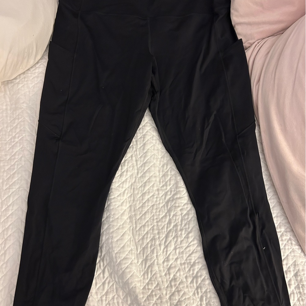 Black Lululemon leggings. No size tag but approx 14/16